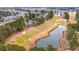 Aerial view of community with golf course and lake at 248 Sun Colony Blvd. # A-305, Longs, SC 29568