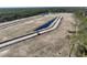 An aerial view of a community in the early stages of construction at 25 Northbrook Dr, Murrells Inlet, SC 29576