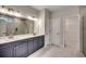 Elegant bathroom with double vanity, walk-in shower, and modern finishes at 25 Northbrook Dr, Murrells Inlet, SC 29576