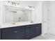 Modern bathroom featuring double vanity, white countertops, and gold hardware at 25 Northbrook Dr, Murrells Inlet, SC 29576