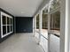 Covered porch with concrete floor and screened openings at 25 Northbrook Dr, Murrells Inlet, SC 29576