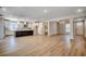 Open concept with kitchen island, dining space, and front door at 25 Northbrook Dr, Murrells Inlet, SC 29576