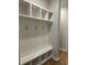 Mudroom with built-in bench, cubbies, and hooks for storage at 25 Northbrook Dr, Murrells Inlet, SC 29576