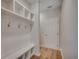 Mudroom features a built-in bench, storage cubbies, and coat hooks for organized entry at 25 Northbrook Dr, Murrells Inlet, SC 29576