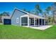 Attractive home featuring a covered porch and spacious yard at 25 Northbrook Dr, Murrells Inlet, SC 29576