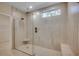 Contemporary walk-in shower with bench and neutral tile surround at 25 Northbrook Dr, Murrells Inlet, SC 29576