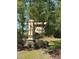 Elegant community sign welcomes you to Northbrook, set amidst lush landscaping and mature trees at 25 Northbrook Dr, Murrells Inlet, SC 29576