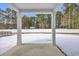 Snowy backyard with a white vinyl fence at 274 Columbus St., Conway, SC 29526