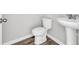 Clean bathroom with pedestal sink and corner toilet at 274 Columbus St., Conway, SC 29526