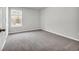 Spacious bedroom with neutral carpeting and window at 274 Columbus St., Conway, SC 29526