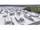 Aerial view of a snow-covered neighborhood with houses at 275 Columbus St., Conway, SC 29526