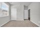 Bright bedroom with neutral carpeting and window at 275 Columbus St., Conway, SC 29526