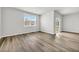 Bedroom with hardwood floors, window, and sliding door to patio at 275 Columbus St., Conway, SC 29526