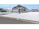 Gray siding house with white garage door and snow covered lawn at 275 Columbus St., Conway, SC 29526