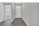 Bright entry hall with wood-look floors and access to other rooms at 281 Columbus St., Conway, SC 29526