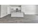 Kitchen island with granite countertop and white cabinets at 281 Columbus St., Conway, SC 29526