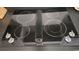 Modern black glass cooktop with four burners and sleek design at 305 W Raft St., Nichols, SC 29581