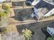 Aerial view of the backyard featuring a large lawn and patio space at 3141 Shorecrest Bay Dr., Murrells Inlet, SC 29576