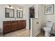 Bathroom featuring double sinks with a walk in closet and a toilet at 3141 Shorecrest Bay Dr., Murrells Inlet, SC 29576