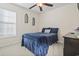 Comfortable bedroom with a ceiling fan, window and a full-size bed at 3141 Shorecrest Bay Dr., Murrells Inlet, SC 29576