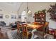 Open-concept dining area featuring hardwood floors, stylish furnishings, and natural lighting at 3141 Shorecrest Bay Dr., Murrells Inlet, SC 29576