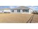 View of the backyard with aluminum fence and neighboring homes at 3409 Ashridge Way, Conway, SC 29526