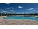 Community pool with plenty of lounge chairs at 3409 Ashridge Way, Conway, SC 29526