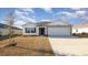 One-story home with a two-car garage and neutral colors at 3409 Ashridge Way, Conway, SC 29526