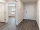 Bright entryway with dark gray vinyl plank flooring at 3430 Ashridge Way, Conway, SC 29526