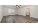 Large bedroom with ceiling fan and hardwood flooring at 3433 Ashridge Way, Conway, SC 29526