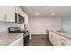 Modern kitchen with white cabinets and granite countertops at 3434 Ashridge Way, Conway, SC 29526