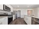 Kitchen showcasing stainless steel appliances, granite countertops, and white cabinets at 3438 Ashridge Way, Conway, SC 29526