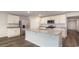 Kitchen island with granite countertop and stainless steel sink at 3484 Ashridge Way, Conway, SC 29526