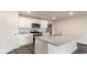 Kitchen island with granite countertop and stainless steel appliances at 3485 Ashridge Way, Conway, SC 29526