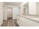 Bathroom with granite countertops, double sinks, and white cabinets at 3488 Ashridge Way, Conway, SC 29526