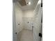 Laundry room with tile flooring, utility sink, and shelving at 35 Northbrook Dr, Murrells Inlet, SC 29576