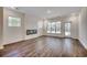 Bright living room with recessed lighting, and an electric fireplace makes a cozy gathering place at 35 Northbrook Dr, Murrells Inlet, SC 29576