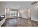 Spacious living room features recessed lighting, luxury vinyl flooring and a fireplace at 35 Northbrook Dr, Murrells Inlet, SC 29576