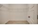 Walk-in closet with wire shelving and tile flooring at 35 Northbrook Dr, Murrells Inlet, SC 29576