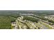 Wide aerial view of a large neighborhood with houses and waterways at 363 Junco Circle, Longs, SC 29568