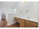 Bathroom with wood vanity, single sink and a window at 363 Junco Circle, Longs, SC 29568