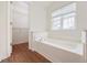 Bathroom with bathtub and walk-in closet at 363 Junco Circle, Longs, SC 29568