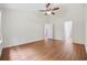 Bright bedroom with wood-look flooring and access to other rooms at 363 Junco Circle, Longs, SC 29568