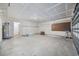 Unfinished garage with pegboard and shelving at 363 Junco Circle, Longs, SC 29568