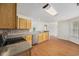 Spacious kitchen with wood cabinets, tiled backsplash, and stainless steel appliances at 363 Junco Circle, Longs, SC 29568