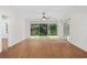 Bright living room with hardwood floors and access to backyard at 363 Junco Circle, Longs, SC 29568