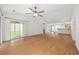 Open living space with hardwood floors and access to patio at 363 Junco Circle, Longs, SC 29568