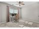 Bright bedroom with window and ceiling fan at 409 Carrick Loop, Longs, SC 29568