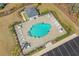 Aerial view of community pool with lounge chairs and patio area at 409 Carrick Loop, Longs, SC 29568