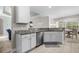 Kitchen with granite countertops, white cabinets, and stainless steel appliances at 409 Carrick Loop, Longs, SC 29568